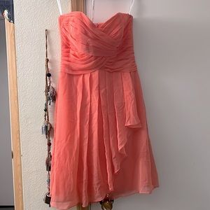 A coral bridesmaid dress. Only worn once.